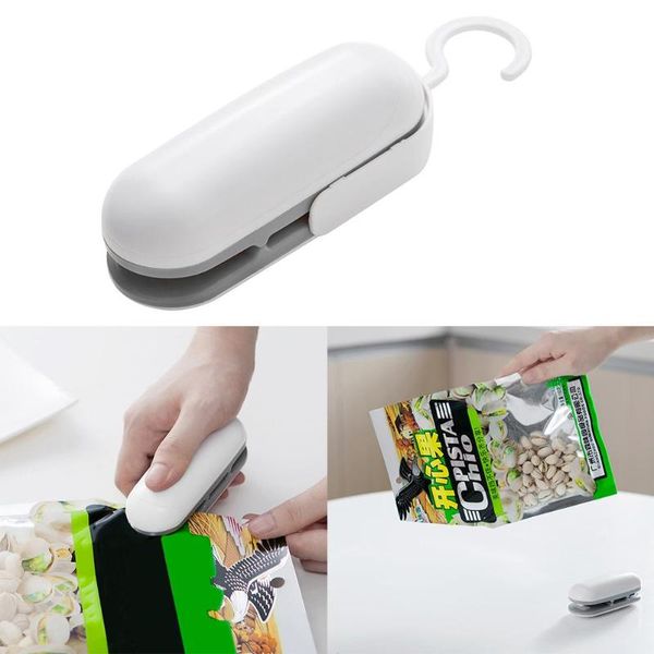 

automatic mini package clamps heat sealing film bags packing machine for household appliances
