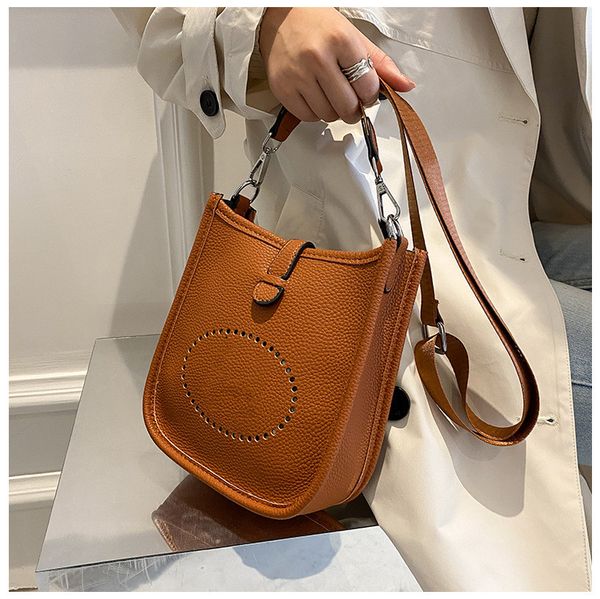 

designer luxury handbags with adjustable straps shoulder bag evelyne chocolat taurillon clemence square tote bags fashion crossbody hollow o