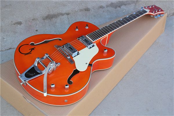 

jazz semi-hollow double f hole orangel electric guitar,bigby bridge and golden hardwares,rectangular frets,rosewood fretboard.