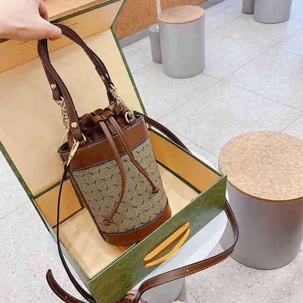 

2022 latest handbag factory store this year's popular female style portable bucket texture ins single shoulder bags