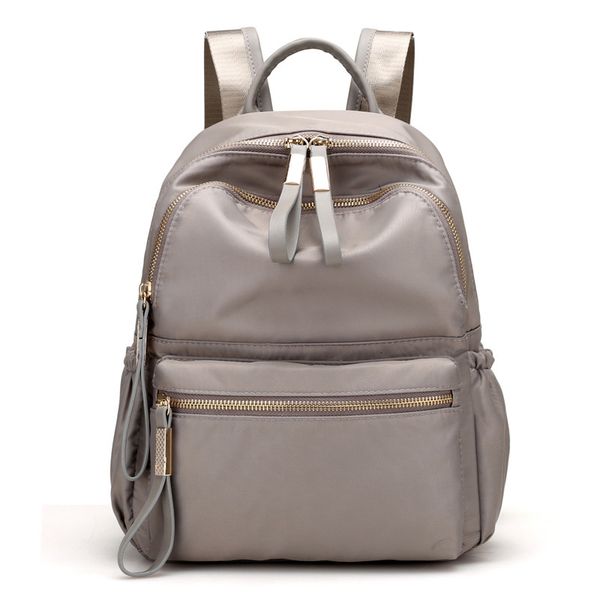 

backpack junior high school students' schoolbag women's simple men's and nylon cloth large capacity bag