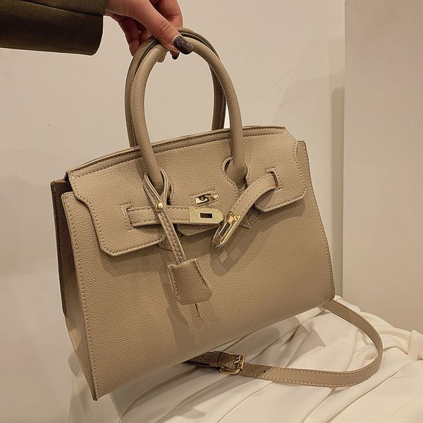 

h family 2021 new one shoulder hand-held leather tote women's large capacity bag