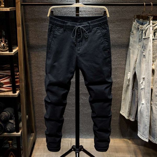 

spring and autumn black lace up waist jeans men's elastic slim legged trouserswinter