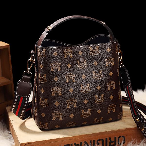 

handbag 2021 women's bag old pattern printed one shoulder slant span leather bucket, Black;red