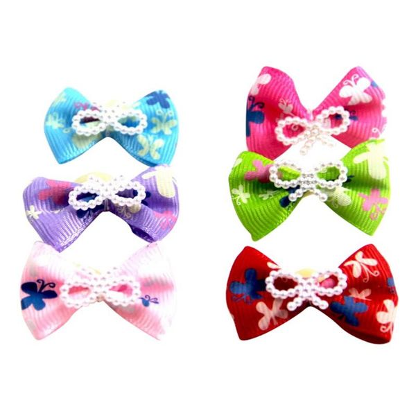 

dog apparel 10 pcs pet cat puppy bow knot headdress with rubber bands color random