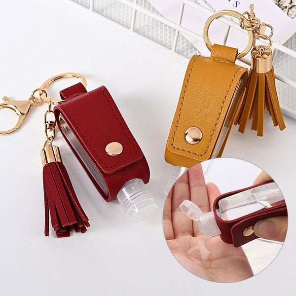 

keychains portable empty leakproof plastic travel bottle key chain for hand sanitizer with tassels leather keychain holder clip, Silver