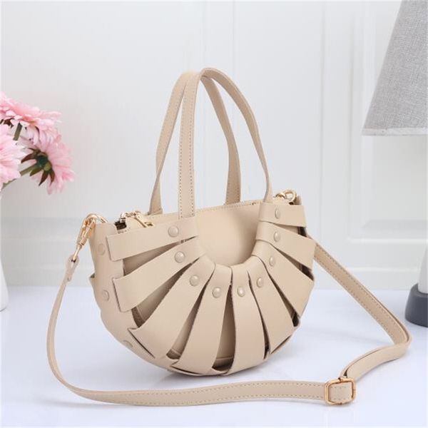 

2021 shell bag, hollowed out vegetable basket holiday knitting hand-held slung female bucket bag luxuryss designerss bag yw