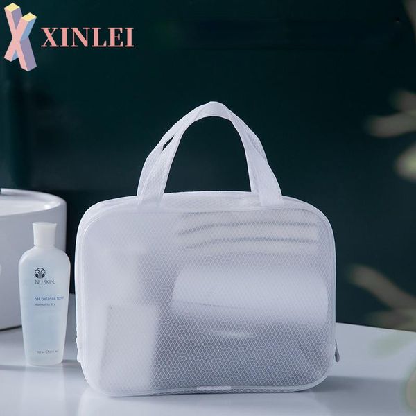 

cosmetic bags & cases xinlei large-capacity stylish atmosphere white waterproof business trip wash and travel storage bag female xb226