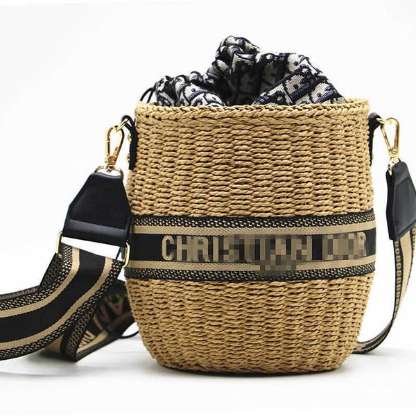 

d europe 2021 new women's bucket hand woven straw bag messenger zly