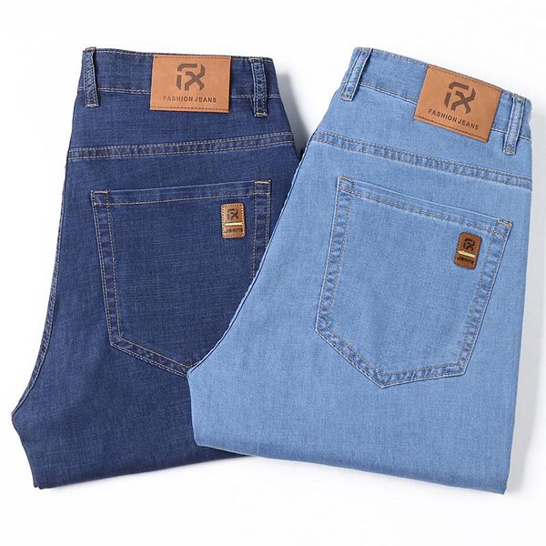 

men's jeans plus size 40 42 44 2021 summer men thin right light blue fashion ice silk dust elastic loose denim broek