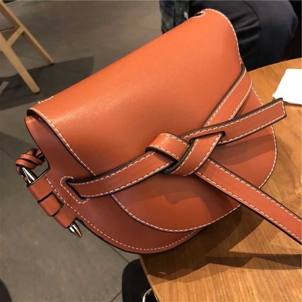

french niche bag women's 2021 new chaoluo gate retro saddle leather crossbody bag zly