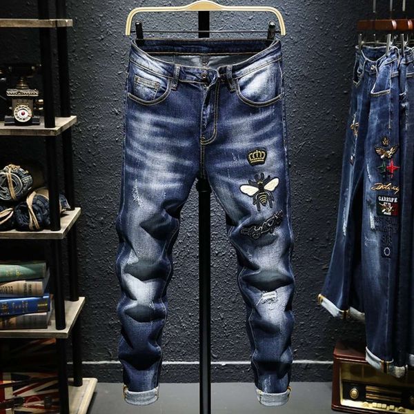 

spring and autumn blue embroidered badge jeans men's fashion brand slim small feet versatile elastic long pantswinter