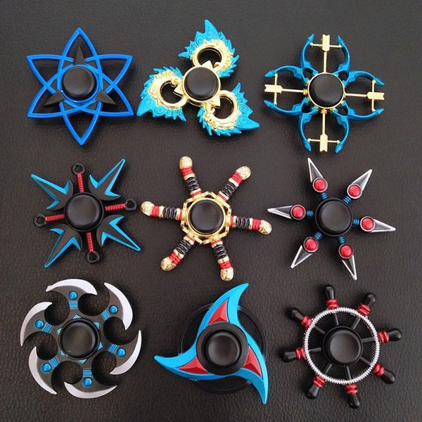 Metallo colorato Fidget Finger Focus Toy Adulto Arcobaleno in lega di zinco Ninja Shuriken Sharingan Giocattoli per bambini Cuscinetto