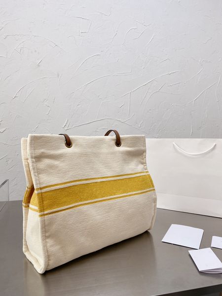 

luxury goods tote shopping bags feeling whole package line is concise and agile modelling fluent canvas bag original cloth