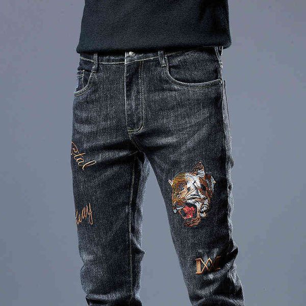 

jeans autumn men's slim fit small feet international special korean embroidery tide brand tiger head, Blue