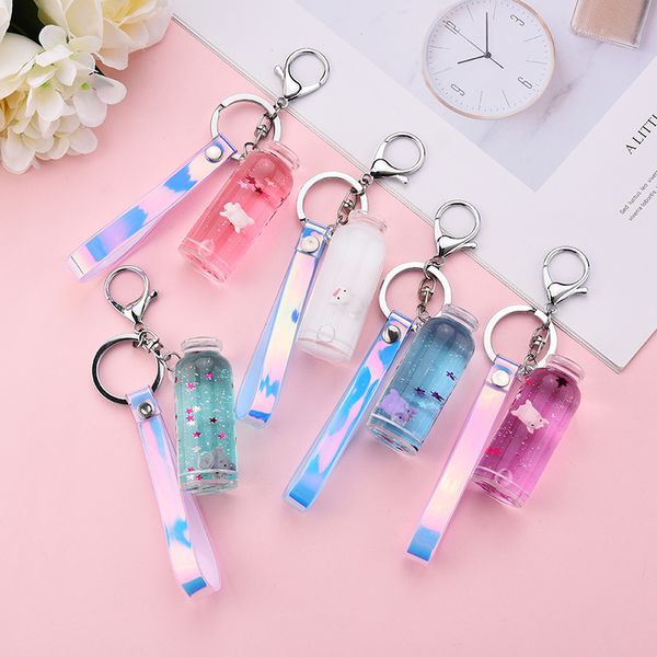 

2021 fashion keychain net red floating quicksand key chain liquid drifting milk bottle pendant pig grab machine doll small gift, Slivery;golden