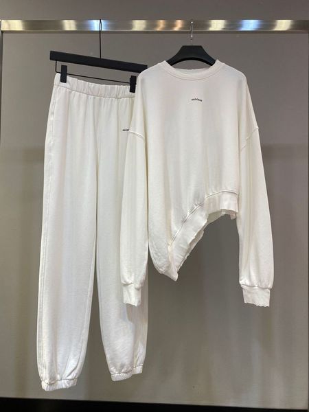 

2121 spring new irregular hem wear holes embroidery small letter sweater + pants casual suit0, White