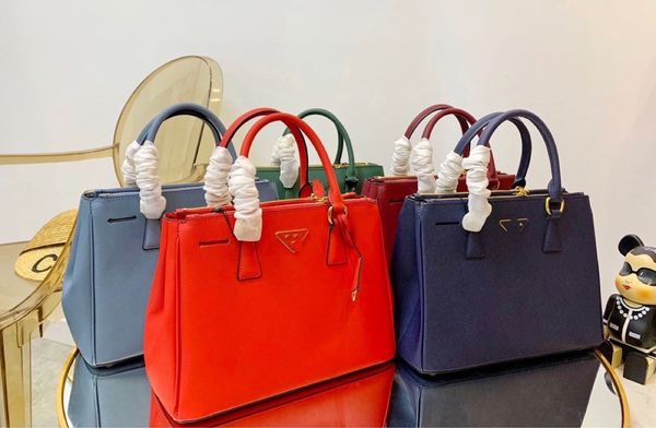 

2021 leisure hard handle orange solid color middle zipper sewing vertical square three dimensional bag15vw