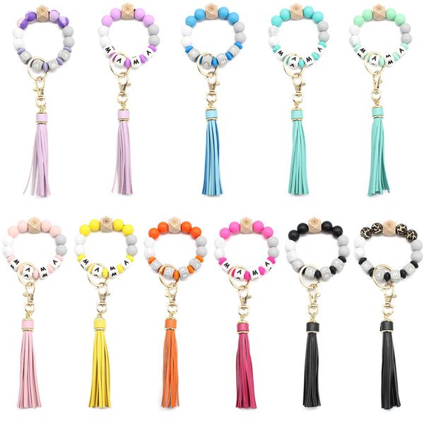 

2022 eu us fashion silicone beads mama bracelets toys alloy keyring food grade wristbands beech party favor tassel key chain pendant leather