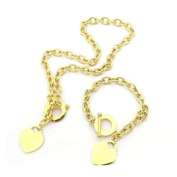 

wholesale 18k sun gold women brands wed jewelry gift brand luxury stainless steel vintage pendant heart jewelry set earring necklace ou74x, Silver