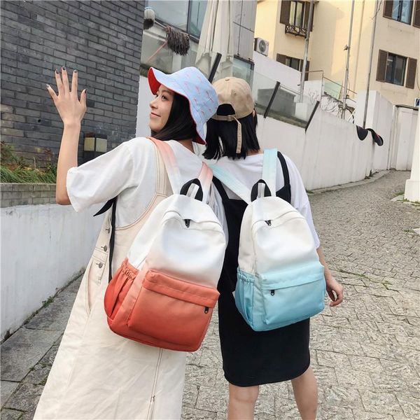 

backpack gradient couple female 2021 wild junior high school student schoolbag fashion large capacity sports men