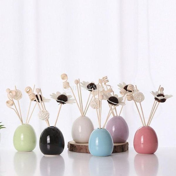 

artificial flower ceramic vase essential oil perfume bottle holder decor