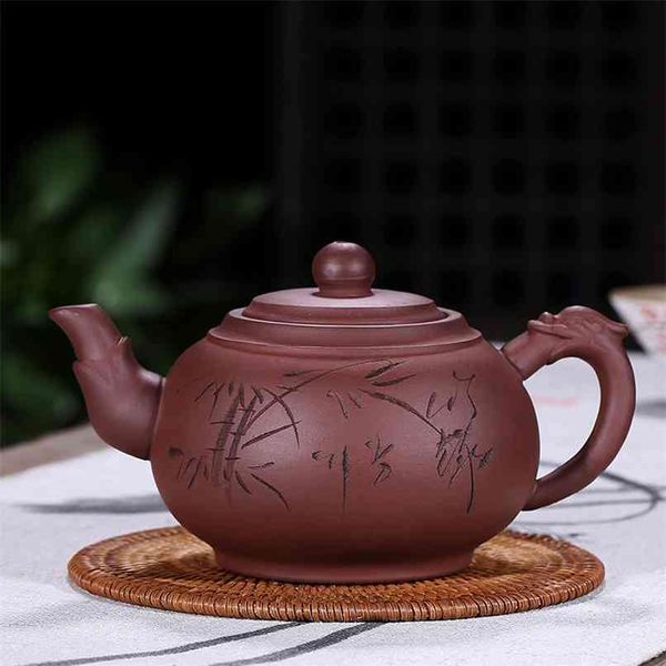 Teiera cinese Yixing vaso di terracotta viola fatto a mano forma unica casseruola domestica Dahongpao Tieguanyin set 450ml 210621