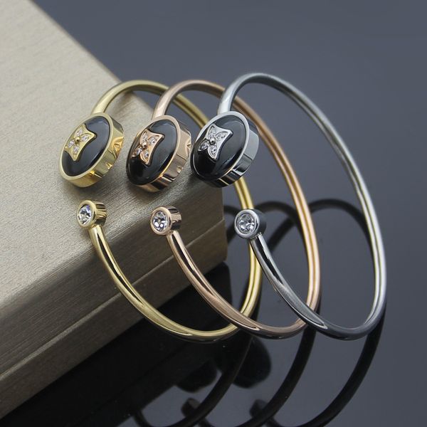 

europe america fashion style lady women titanium steel black onyx setting diamond v initials open bangle bracelet 3 color