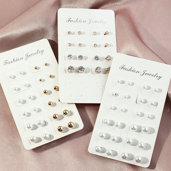 

12 pairs of round with imitation pearl zircon earrings, Silver