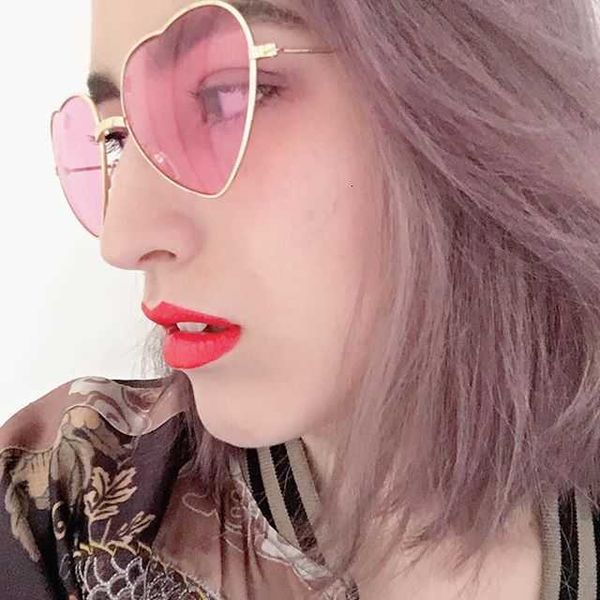 

luxury designer sunglasses ladies heart shaped metal women brand designer fashion rimless love clear ocean lenses sun glasses oculos uv400, White;black