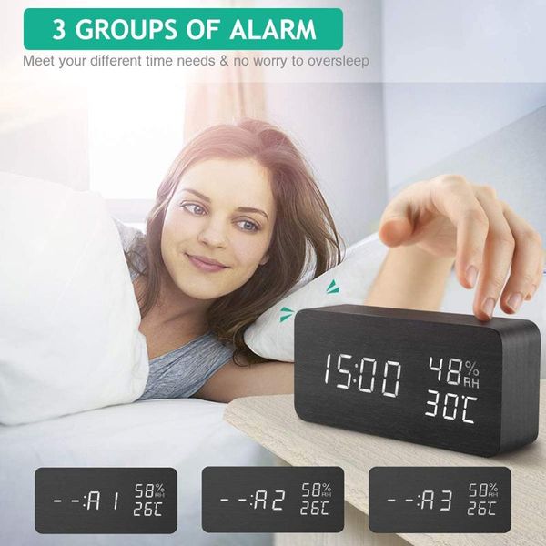 

digital alarm clock, date temperature indicator led display wooden clock, 3 levels brightness voice control, 3 alarm settings