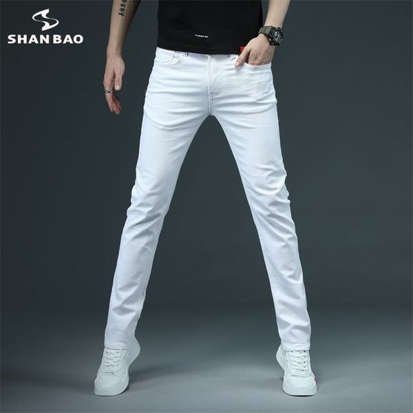 Shan Bao Men's Slim White Jeans Primavera Marca de Alta Qualidade Confortável Algodão Estiramento Moda Casual Calças 210723