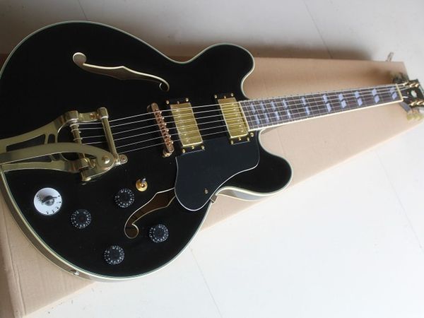 

black jazz semi-hollow guitar with big rocker 5 gears