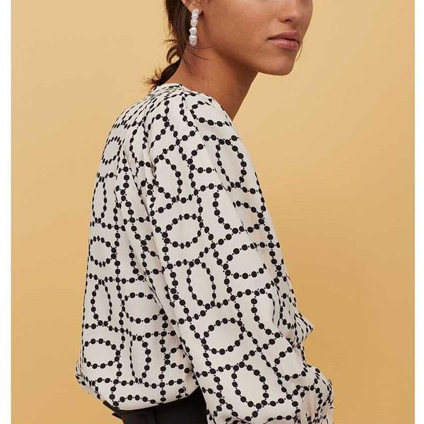 

minimalist abstract polka dot printed puffy blouse elegant beige/tan art chain link cropped shirt simplicity v-neck viscose, White