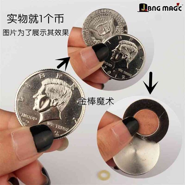 

Close view of butterfly coins penetrating the table through glass Liu Qian Spring Festival Gala Coins magic props 9g