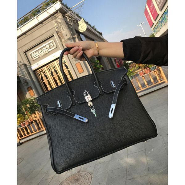 

factory outlet design women's lychee pattern head leather bag, simple and fashionable one shoulder handbag