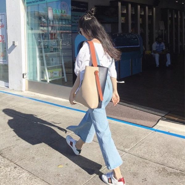 

new korean simple coloured water barrel true leather tote oblique coloured single shoulder women's bag, 2021