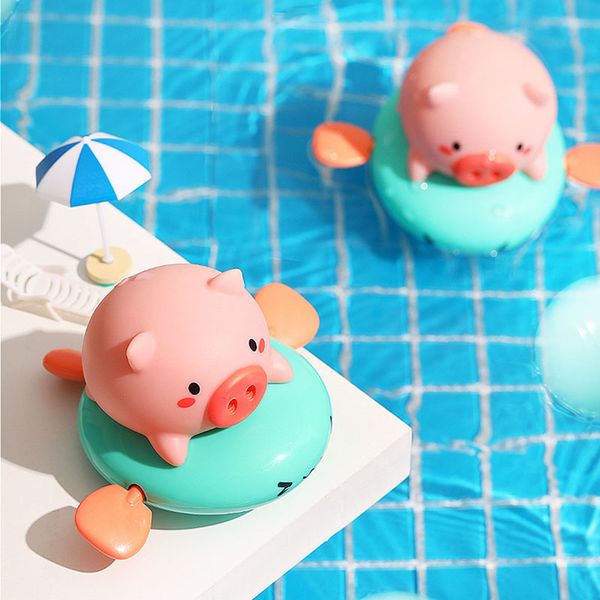 

1pcs cute cartoon pig float wind-up clockwork baby bath toys abs plastic infant swimming toys funny infant toy