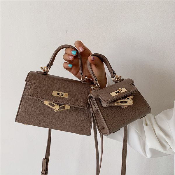 

bag small women's new fashion solid color single shoulder messenger bag simple lock hand outlet purse