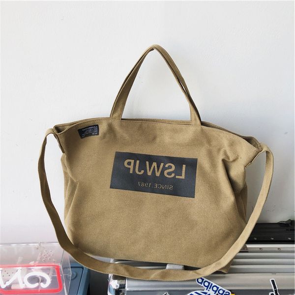 

autumn new women's canvas hand water wash men's and same messenger street fashion travel bag