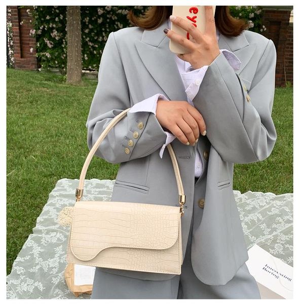 

evening bags women's in 2021, the crocodile-shaped flip shoulder handbag baguette bag retro underarm niche design