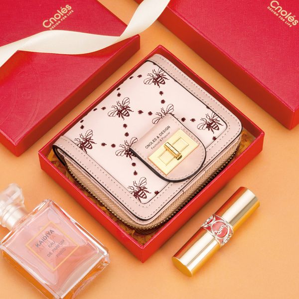 

2021 new cowhide short zipper simple folding card bag zero wallet women's