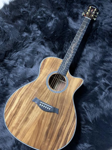 

2022 green earth 40" 6-string acoustic guitar. spruce and acacia back and sides.