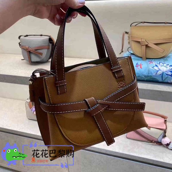 

bag holderloewe / luo yiwei women's gate mini pebble pattern hand one shoulder straddle saddle baghandbag hook