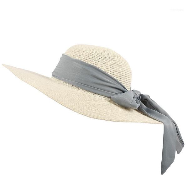 

women's beach hats, travel weaving, outdoor sun-shading and sunscreen bowknot big-brimmed hats1