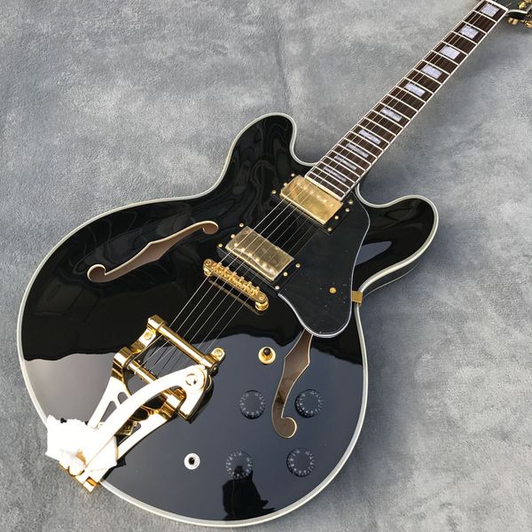 

delivery, electric guitar,black jazz gold hardware