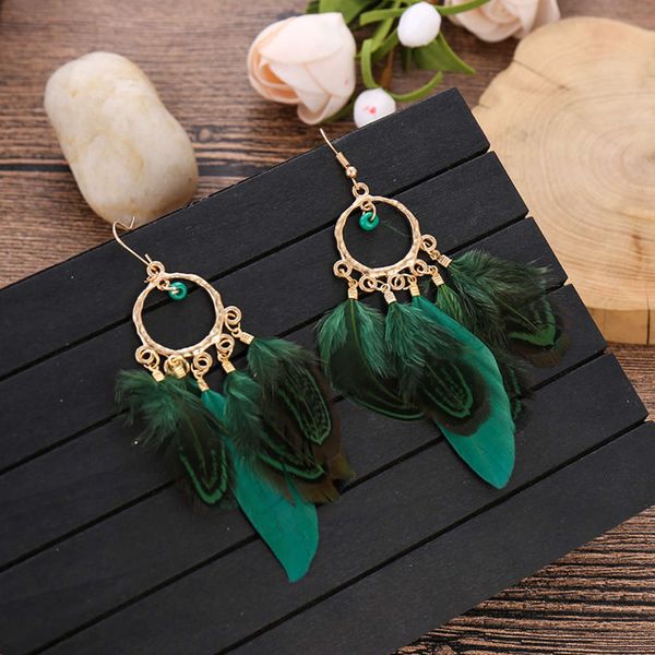 

round bead feather earrings