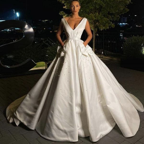 

simple new elegant a-line wedding dresses deep v-neck pearls sweep train satin backless bows pockets bridal gowns wedding dress, White