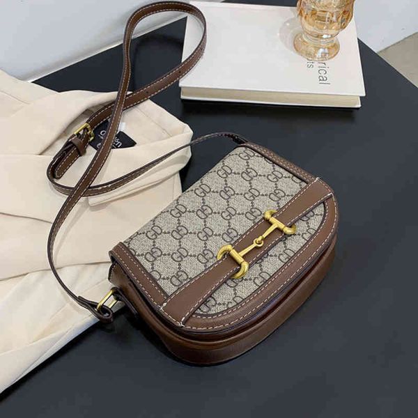 

2022 latest handbag factory store on printed saddle ponytail buckle semicircle small women's single shoulder messenger flap 87kn