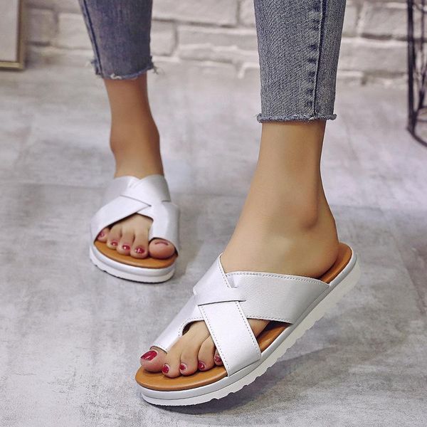 

slippers a seller in 2021 is women wearing leather with slope heels, Black